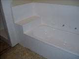 Gleaming white bathroom after resurfacing