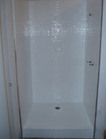 Gleaming white shower recess after resurfacing